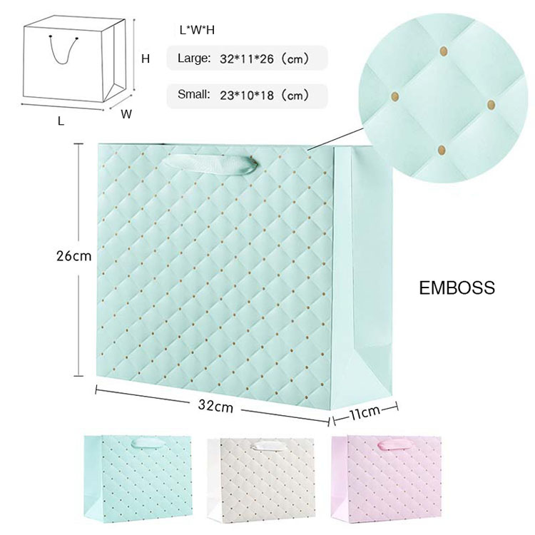 Logotipo impreso personalizado Bolsa de papel blanco de lujo bolsas de papel de regalo de compras minoristas con su propio logotipo