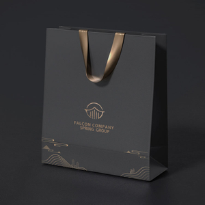 Bolsa de papel de regalo de embalaje de ropa de papel negro de lujo con logotipo de marca personalizado