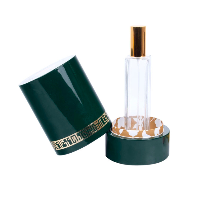 Etiqueta de metal redonda con decoración de borde y patrones, pintura de piano verde, caja de madera de perfume de alta gama