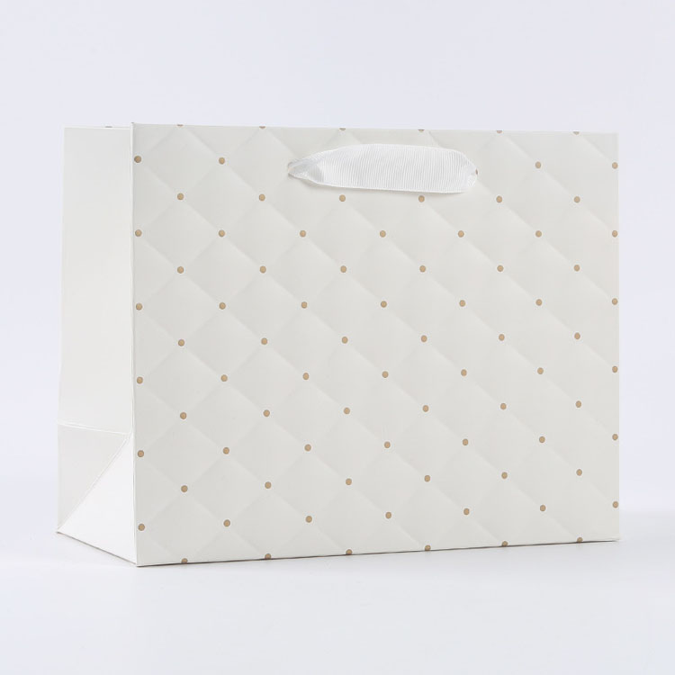 Logotipo impreso personalizado Bolsa de papel blanco de lujo bolsas de papel de regalo de compras minoristas con su propio logotipo