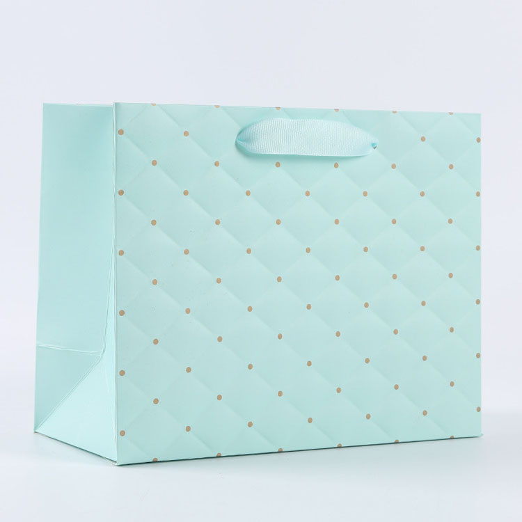 Logotipo impreso personalizado Bolsa de papel blanco de lujo bolsas de papel de regalo de compras minoristas con su propio logotipo