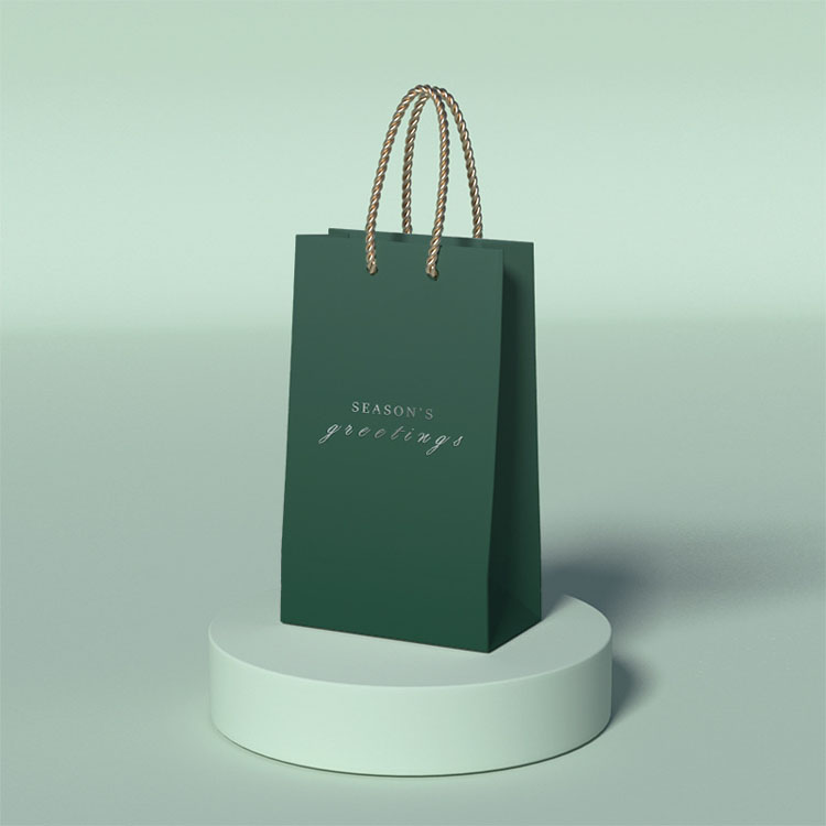 Bolsa de papel de regalo de embalaje de ropa de papel negro de lujo con logotipo de marca personalizado